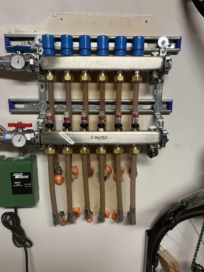 Plumber performing Gas Line Installation at a residential property in Claryville