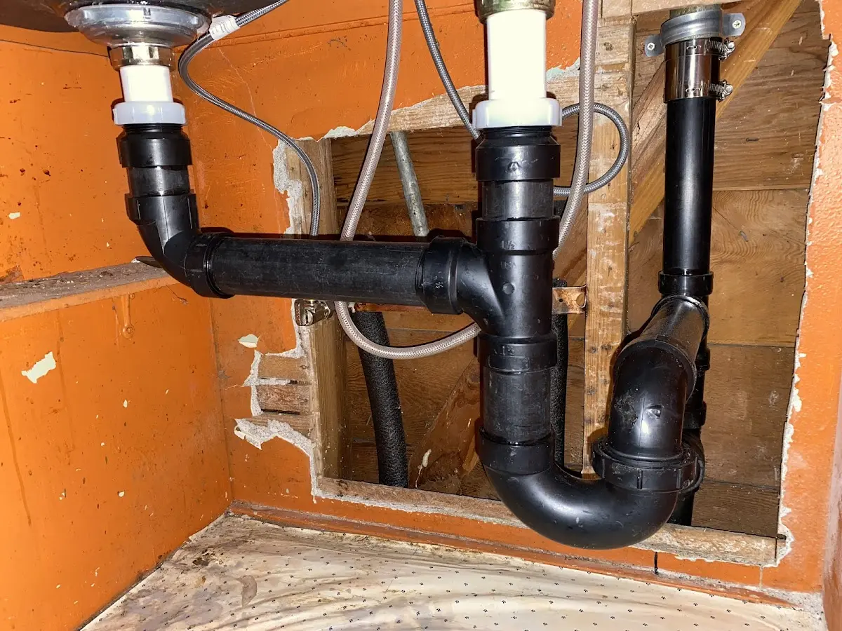 Professional Garbage Disposal Repair equipment and tools on the job in Claryville